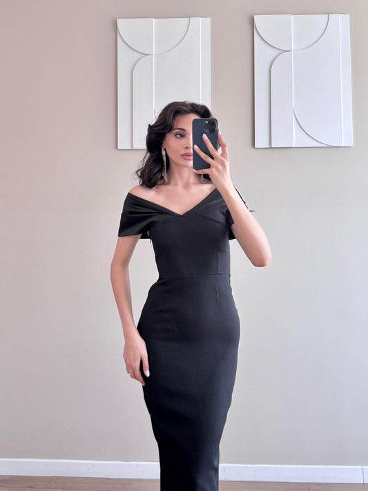 Black Dress With a Slit At The Shoulders