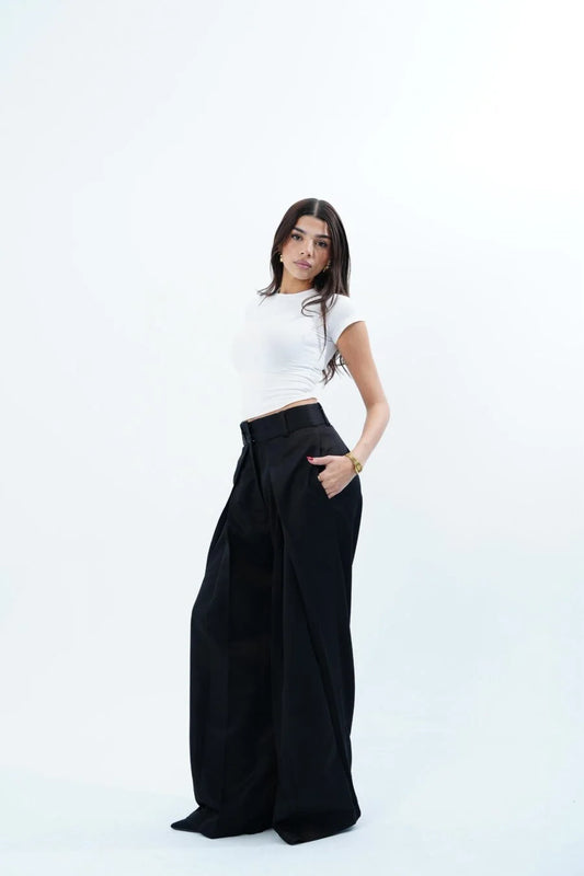 FOLDED BLACK TAILORED TROUSERS