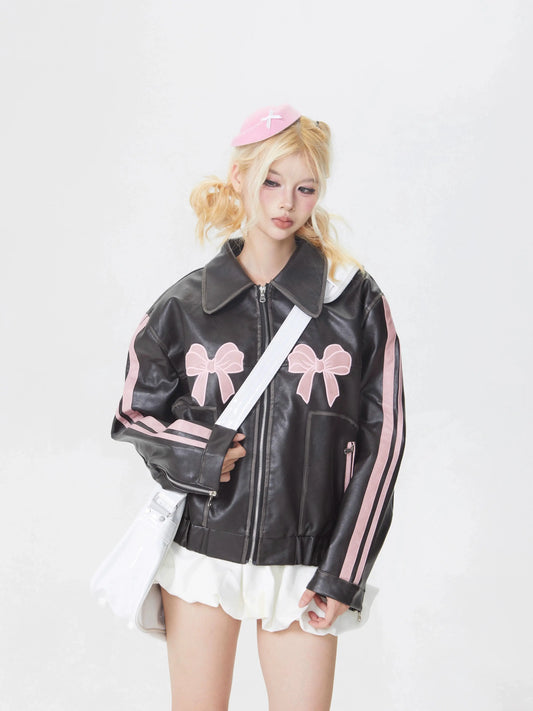 جاكيت من الجلد الصناعي مطرز بفيونكة