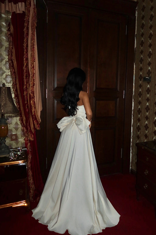 Beige Lilou bow detail evening dress