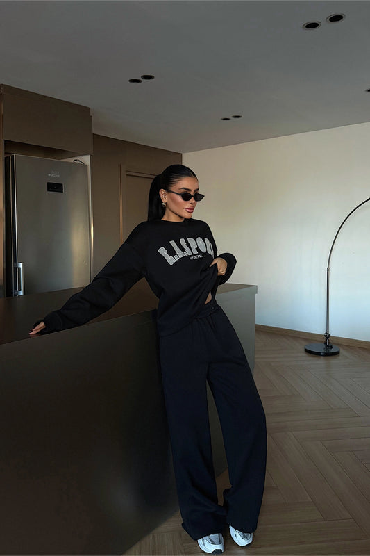 بدلة رياضية سوداء من إيست سبورت