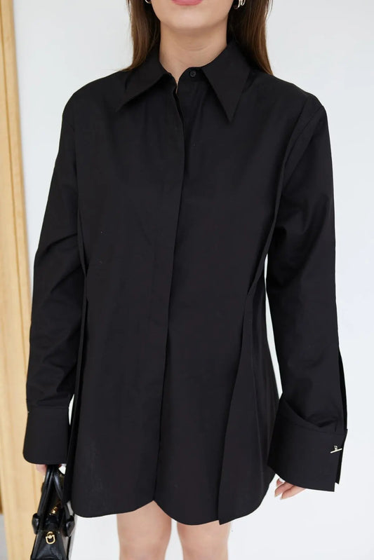 قميص قطني مطوي