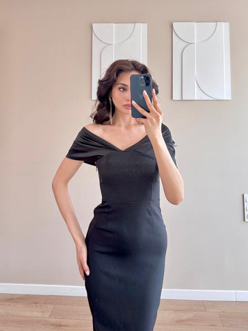 Black Dress With a Slit At The Shoulders
