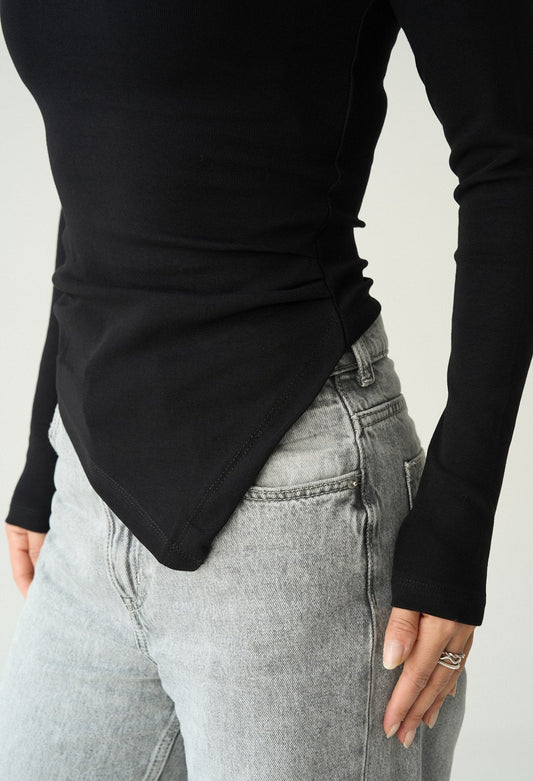 Long sleeve asymmetrical length sweater