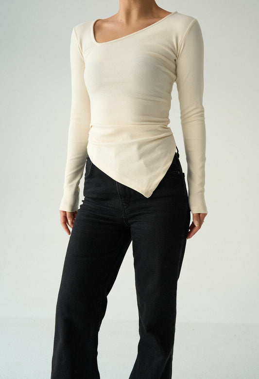 Long sleeve asymmetrical length sweater